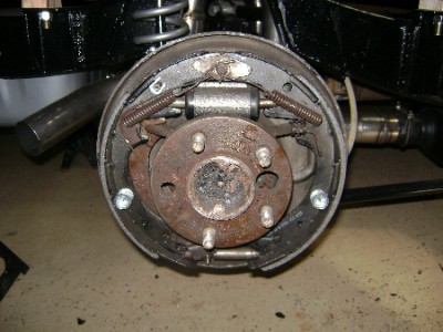 the brakes. I planned on getting new axles so I didnt worry about the missing stud for now.